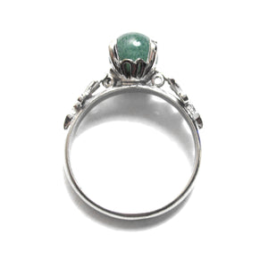  Antique Edwardian jade ring prong set in a high-mount silver setting